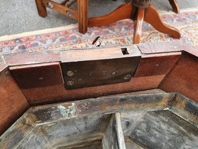 Lot 181 - A GEORGE III MAHOGANY OCTAGONAL BRASS BOUND WINE COOLER