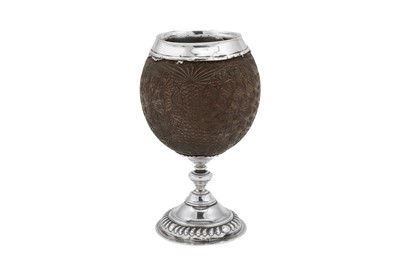 Lot 663 - A George II / George III unmarked silver mounted coconut cup, probably London circa 1760