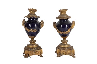 Lot 106 - A PAIR OF FRENCH GILT BRONZE AND BLUE PORCELAIN URNS, LATE 19TH/EARLY 20TH CENTURY