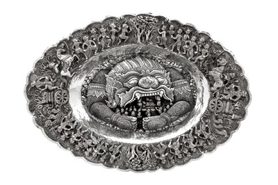 Lot 229 - A heavy mid-20th century Thai silver charger or dish, Chiang Mai circa 1960
