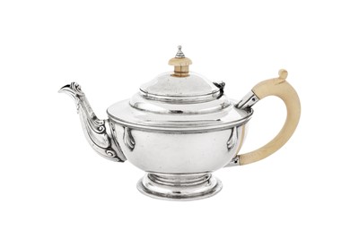 Lot 570 - A George V Art Deco sterling silver three-piece tea service, London 1931 by Charles Boyton