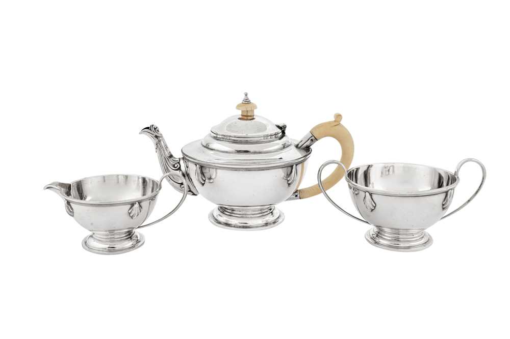 Lot 570 - A George V Art Deco sterling silver three-piece tea service, London 1931 by Charles Boyton