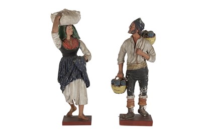 Lot 118 - A PAIR OF FRENCH PAPIER MACHE SPA FIGURES OF TWO STREET VENDORS, LATE 19TH/EARLY 20TH CENTURY