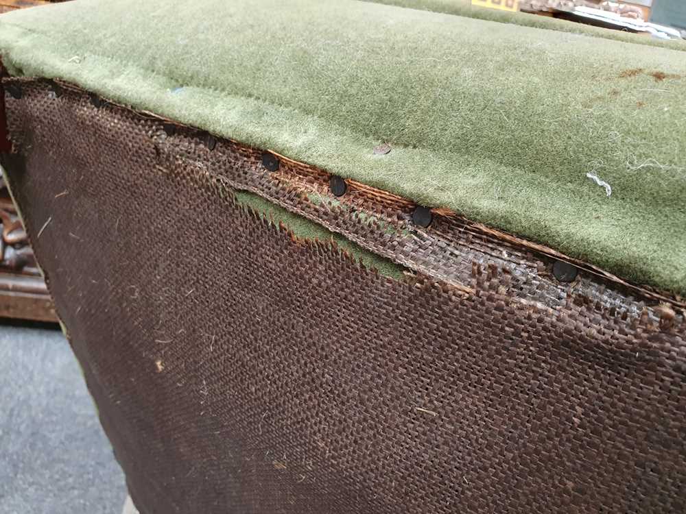 Lot 185 A VICTORIAN TUB CHAIR ON CASTORS