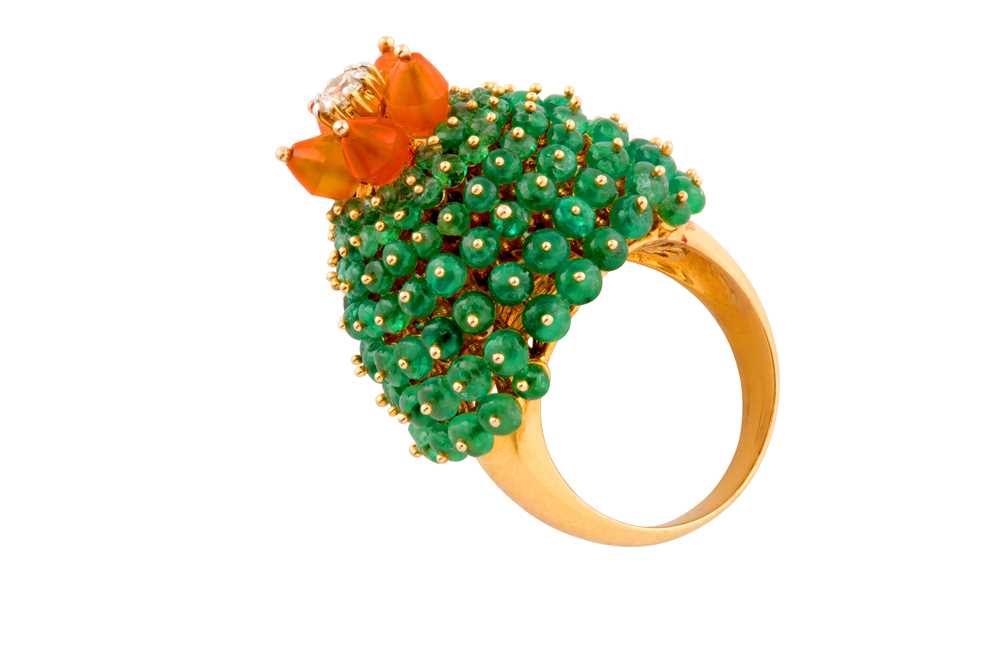 Lot 109 - An emerald, fire opal and diamond bombé ring