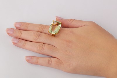 Lot 144 - A gold and green quartz ring