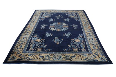 Lot 27 - A CHINESE CARPET