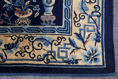 Lot 27 - A CHINESE CARPET