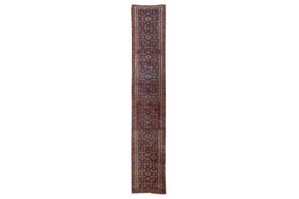 Lot 59 - AN ANTIQUE NORTH-WEST PERSIAN RUNNER