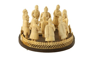 Lot 412 - λ ELEVEN CARVED IVORY FIGURES OF THE FIRST SIKH RULER, MAHARAJA RANJIT SINGH, AND HIS COURT