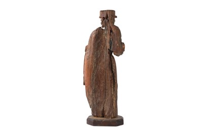Lot 182 - A 16TH CENTURY CARVED WOOD AND POLYCHROME DECORATED FIGURE OF A SAINT
