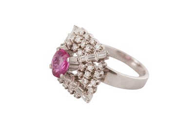 Lot 54 - A pink sapphire and diamond dress ring