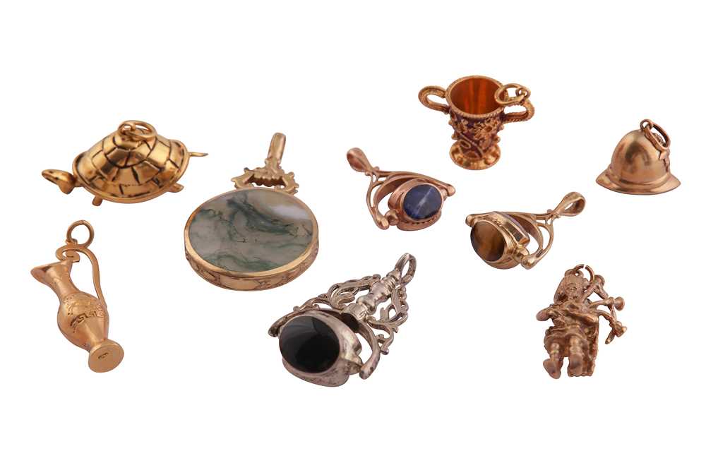 Lot 724 - A GROUP LOT OF CHARMS AND FOBS