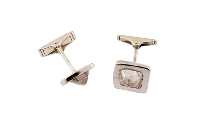 Lot 133 - De Beers | A pair of white gold and diamond 'Talisman' cufflinks