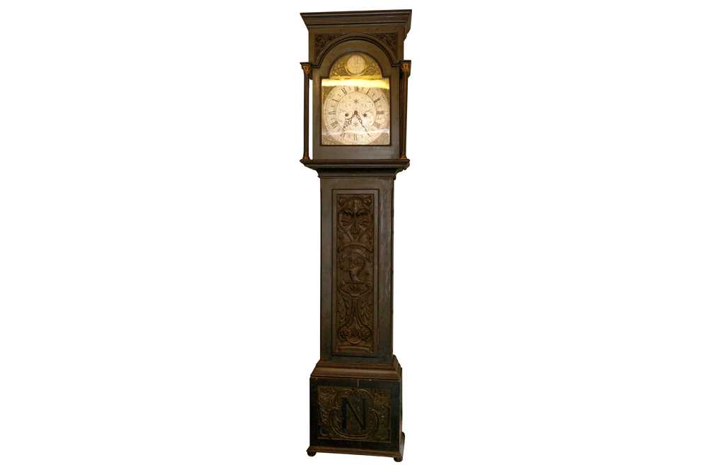 Lot 70 - A MID 19TH CENTURY STAINED AND CARVED OAK LONGCASE CLOCK