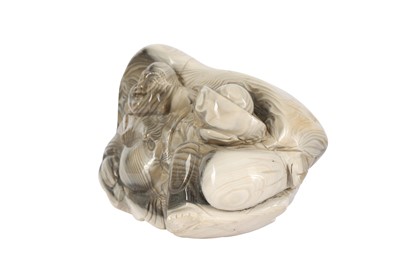 Lot 329 - A CHINESE CARVED POLISH FLINT MODEL OF HAPPY BUDDHA