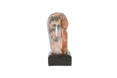Lot 312 - A CARVED AND POLISHED TIMOR AMMONITE DEPICTING A HUMAN SKULL, 250 MILLION YEARS OLD