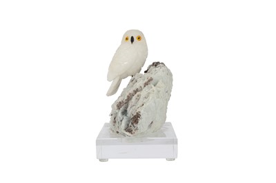 Lot 330 - A 20TH CENTURY CARVED ROCK CRYSTAL MODEL OF A SNOWY OWL PERCHED ON A QUARTZ MATRIX