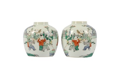 Lot 543 - A PAIR OF CHINESE FAMILLE VERTE 'BOYS' JARS.