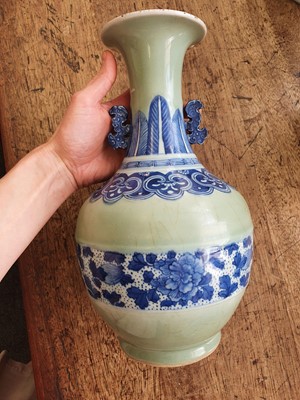 Lot 91 - A CHINESE CELADON-GROUND VASE.