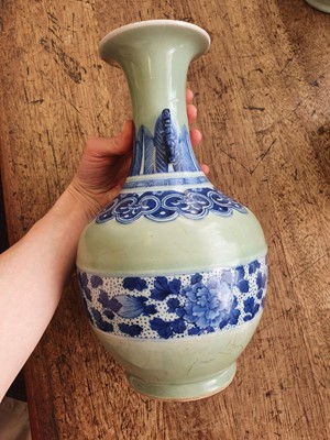 Lot 91 - A CHINESE CELADON-GROUND VASE.