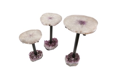 Lot 322 - A SET OF THREE POLISHED QUARTZ AND AMETHYST TABLES, SOUTHERN BRAZIL