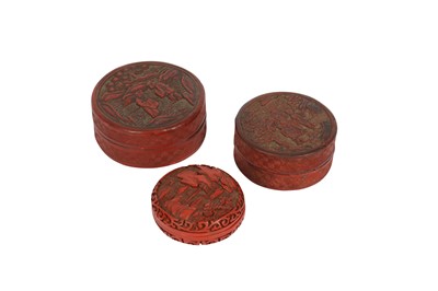 Lot 742 - THREE CHINESE CIRCULAR CINNABAR LACQUER BOXES AND COVERS.