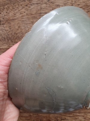 Lot 470 - A KOREAN CELADON-GLAZED BOWL.