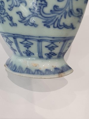 Lot 25 - A NEAR - PAIR OF CHINESE BLUE AND WHITE WALL VASES.