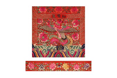 Lot 108 - TWO CHINESE EMBROIDERED RED-GROUND TEXTILE PANELS.