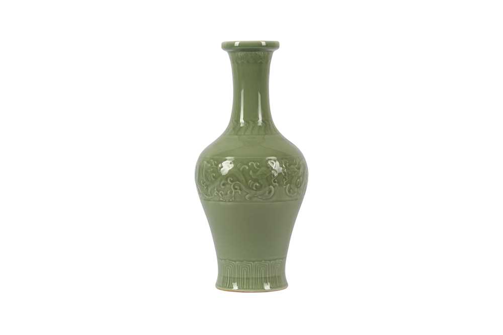 Lot 535 - A CHINESE CELADON-GLAZED 'DRAGON' VASE.