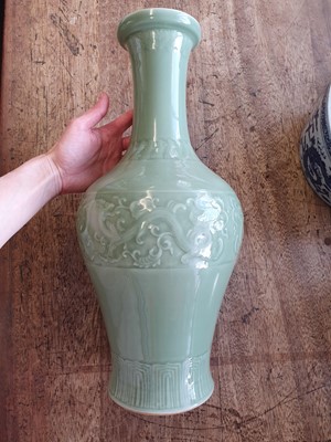 Lot 535 - A CHINESE CELADON-GLAZED 'DRAGON' VASE.