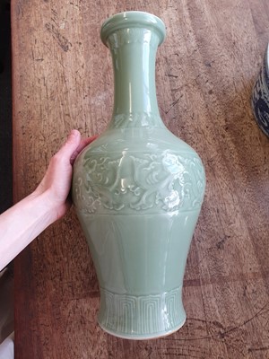 Lot 535 - A CHINESE CELADON-GLAZED 'DRAGON' VASE.