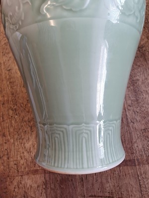 Lot 535 - A CHINESE CELADON-GLAZED 'DRAGON' VASE.