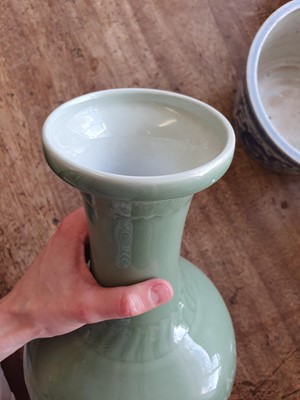 Lot 535 - A CHINESE CELADON-GLAZED 'DRAGON' VASE.