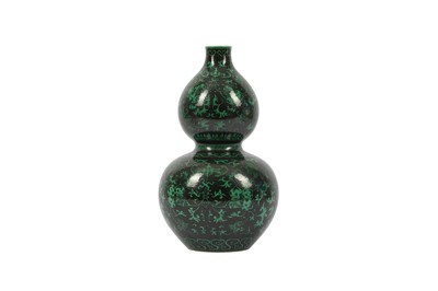 Lot 182 - A CHINESE GREEN-GROUND BLACK-GLAZED DOUBLE GOURD VASE.