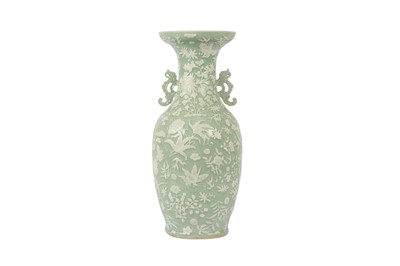 Lot 123 - A CHINESE CELADON SLIP-DECORATED VASE.