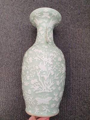 Lot 123 - A CHINESE CELADON SLIP-DECORATED VASE.