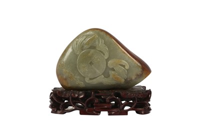 Lot 516 - A CHINESE CELADON JADE PEBBLE CARVING.