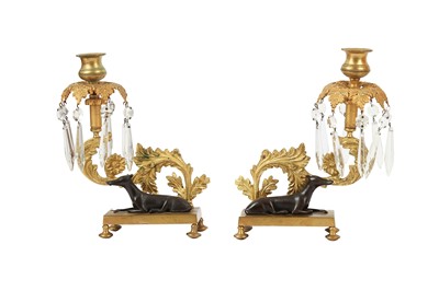 Lot 58 - A PAIR OF REGENCY GILT BRONZE AND PATINATED BRONZE CANDLESTICKS