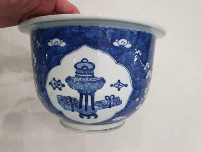 Lot 23 - A PAIR OF CHINESE BLUE AND WHITE PLANTERS.