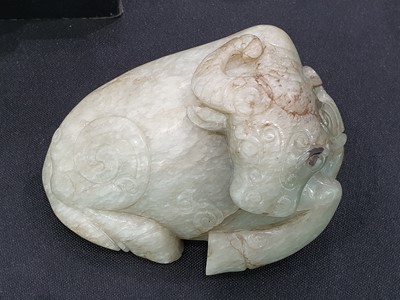 Lot 309 - A CHINESE PALE CELADON JADE 'BUFFALO' CARVING.