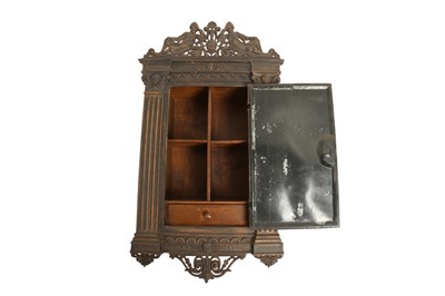 Lot 625 - A CAST IRON AND WOOD CIGAR HUMIDOR WALL CABINET