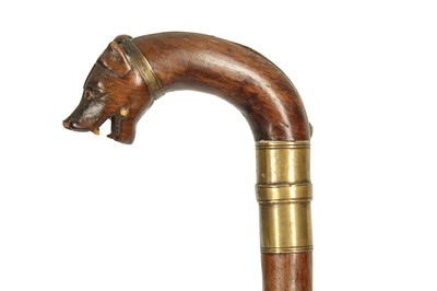 Lot 415 - A WOODEN WALKING STICK WITH A HYENA HEAD