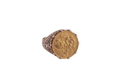 Lot 768 - A HALF SOVEREIGIN RING AND A DE BEERS KEYRING