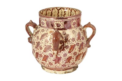 Lot 314 - AN HISPANO-MORESQUE RUBY COPPER LUSTRE POTTERY VASE
