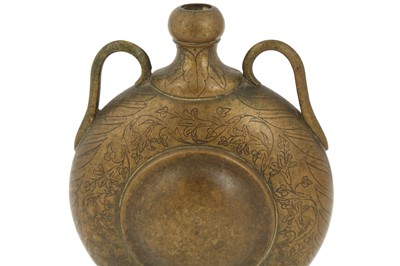 Lot 456 - A SMALL ENGRAVED BRASS PILGRIM FLASK