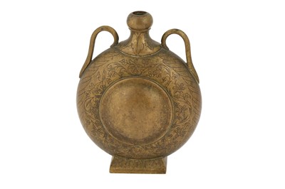 Lot 456 - A SMALL ENGRAVED BRASS PILGRIM FLASK