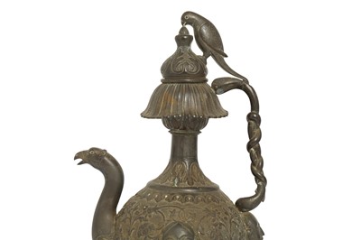 Lot 462 - A COPPER ALLOY REPOUSSÉ EWER WITH FIGURAL DECORATION