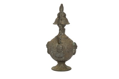 Lot 462 - A COPPER ALLOY REPOUSSÉ EWER WITH FIGURAL DECORATION